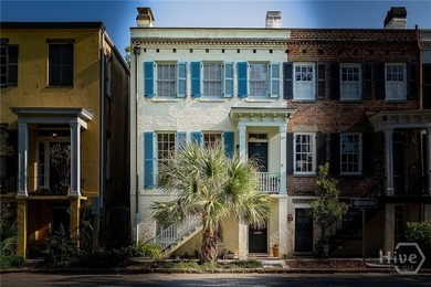 This beautifully renovated c.1852 brick townhome overlooking - photo 2