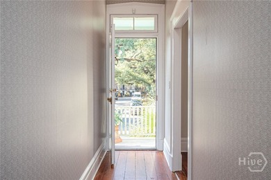This beautifully renovated c.1852 brick townhome overlooking - photo 6