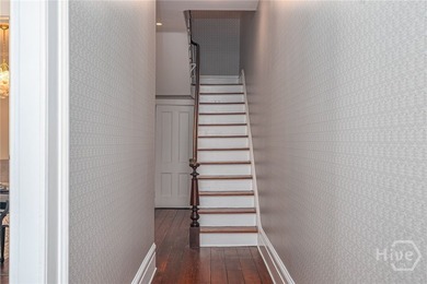 This beautifully renovated c.1852 brick townhome overlooking - photo 7