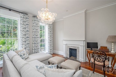 This beautifully renovated c.1852 brick townhome overlooking - photo 8