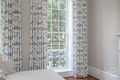 This beautifully renovated c.1852 brick townhome overlooking - photo 9