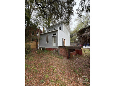 217 E 38th St is a completely gutted, two-story single-family - photo 4