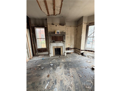 217 E 38th St is a completely gutted, two-story single-family - photo 6