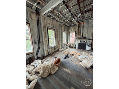 217 E 38th St is a completely gutted, two-story single-family - photo 9