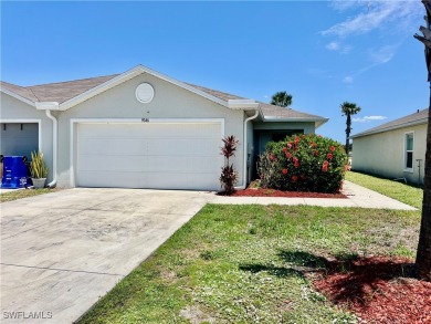 Lake Home For Sale in Lehigh Acres, Florida
