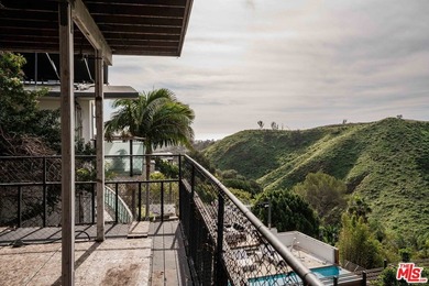BANK OWNED ocean-view Riviera fixer. Offering one of the most - photo 2