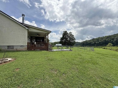 DEEDED LAND!!! GORGEOUS LEVEL WATERFRONT BEAUTY ON LOCUST FORK - photo 24