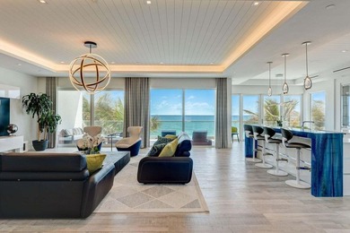 Welcome to this stunning 3-story townhouse in Ocean Ridge. This - photo 12