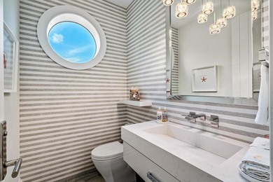 Welcome to this stunning 3-story townhouse in Ocean Ridge. This - photo 26