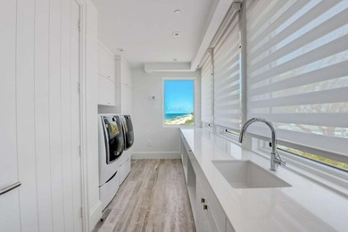 Welcome to this stunning 3-story townhouse in Ocean Ridge. This - photo 32