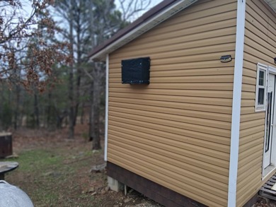 This 1000 sq ft home has 2 bed 2 bath and sits on 14.5 acres - photo 11