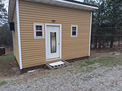 This 1000 sq ft home has 2 bed 2 bath and sits on 14.5 acres - photo 12