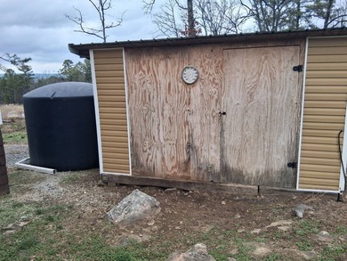 This 1000 sq ft home has 2 bed 2 bath and sits on 14.5 acres - photo 13