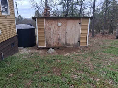 This 1000 sq ft home has 2 bed 2 bath and sits on 14.5 acres - photo 16