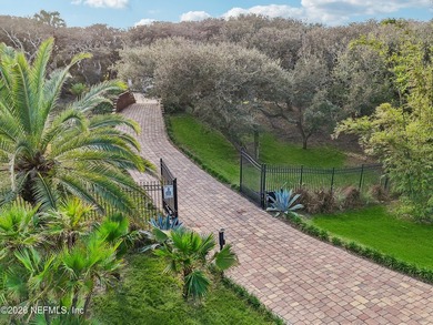Tucked away in a private oasis, this exceptional Mediterranean - photo 3