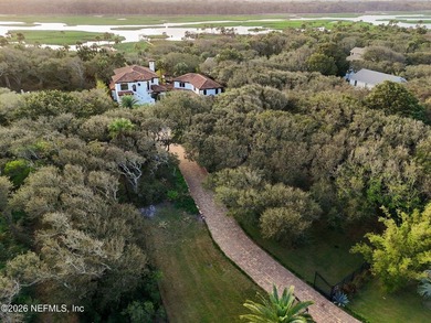 Tucked away in a private oasis, this exceptional Mediterranean - photo 4