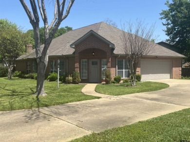 Gorgeous brick home in the gated community of Town Lake Village - Lake Home For Sale in Longview, Texas