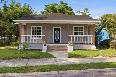 Step inside this fully renovated gem! This 3-bedroom, 2-bath - photo 1