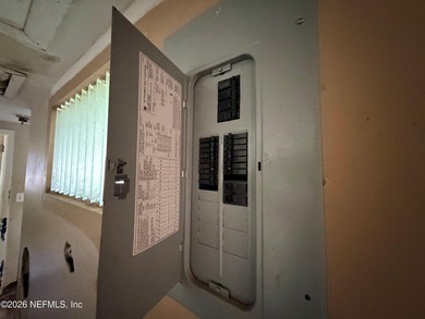 Opportunity awaits! This 1,644-square-foot concrete block home - photo 11