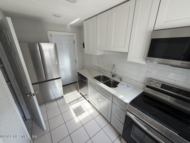This previously renovated 3 bedroom, 2 bath home is in need of - photo 4