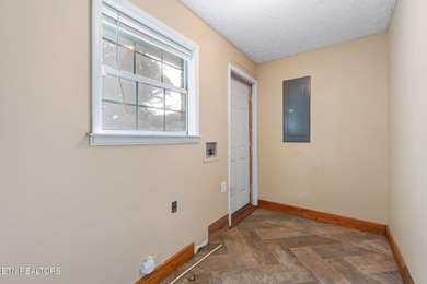 Welcome to this charming 3-bedroom, 1-bath home with a versatile - photo 8