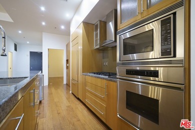 Welcome to modern urban living at ELLEVEN, this Gold LEED luxury