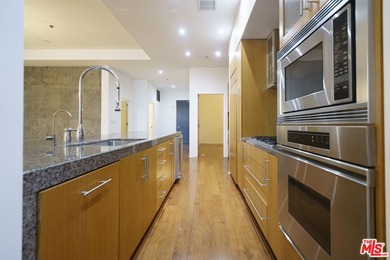 Welcome to modern urban living at ELLEVEN, this Gold LEED luxury