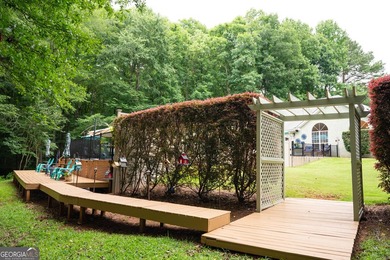 Welcome home to this beautifully maintained 4-bedroom, 2-bath - photo 11