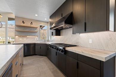 An absolute masterpiece custom home in one of the most - photo 8