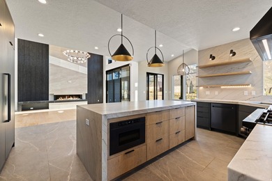 An absolute masterpiece custom home in one of the most - photo 9