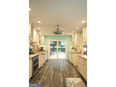 Welcome home to this beautifully maintained 4-bedroom, 2-bath - photo 20