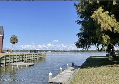 Waterfront lot with direct access to Biloxi Back Bay! Park your - photo 1