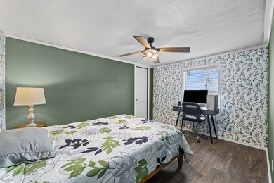 Well-maintained manufactured home situated on a spacious 1 - photo 22