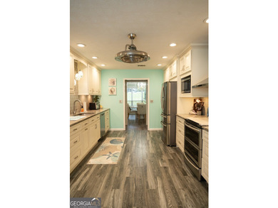 Welcome home to this beautifully maintained 4-bedroom, 2-bath - photo 24