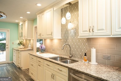 Welcome home to this beautifully maintained 4-bedroom, 2-bath - photo 25