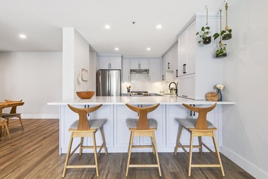 West-facing patio 'backyard' w/a condo price tag! This - photo 1