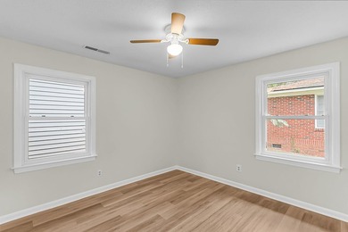 Situated on a spacious lot at 5433 Pennsylvania Avenue, this - photo 13