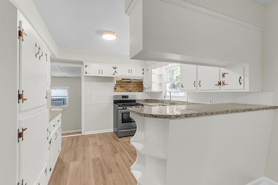 Situated on a spacious lot at 5433 Pennsylvania Avenue, this - photo 20