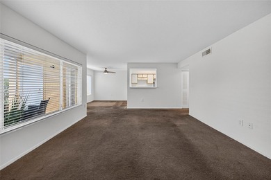 First-floor lakefront unit with screened patio in a gated - photo 2