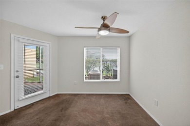 First-floor lakefront unit with screened patio in a gated - photo 5
