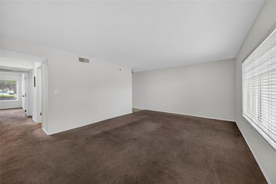 First-floor lakefront unit with screened patio in a gated - photo 7