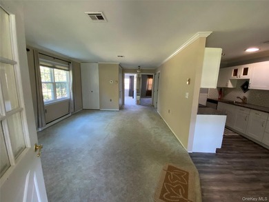 Beautifully Updated Greenbriar Model features 2 Bedrooms, 1 Full - photo 3