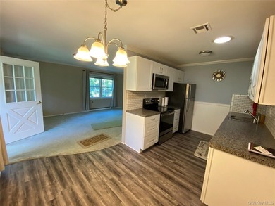 Beautifully Updated Greenbriar Model features 2 Bedrooms, 1 Full - photo 6