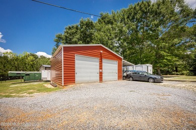 Tucked away on nearly 10 beautiful acres in Saucier, this - photo 5