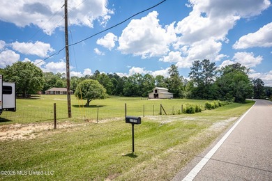Tucked away on nearly 10 beautiful acres in Saucier, this - photo 9