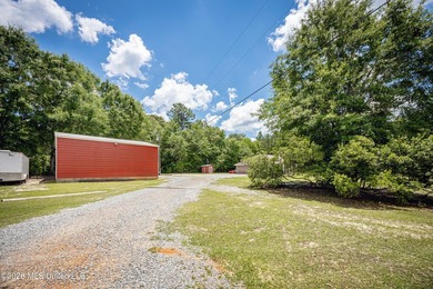 Tucked away on nearly 10 beautiful acres in Saucier, this - photo 10