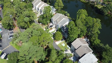 Premium townhome lot with serene lake views in highly desirable - photo 13