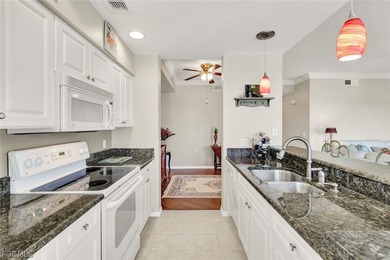 You won't want to miss this condo at HERITAGE POINTE, a gated