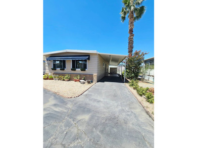 This beautiful and well-maintained manufactured home offers 2 - photo 3
