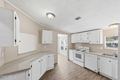 Welcome home! This home offers comfortable living with a relaxed - photo 8